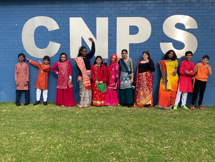 May be an image of 11 people and text